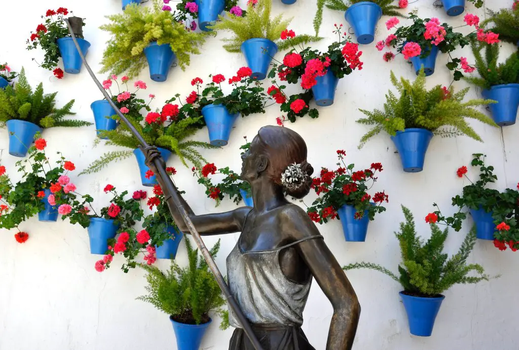 Statue of woman in Cordoba, Spain's flower alley