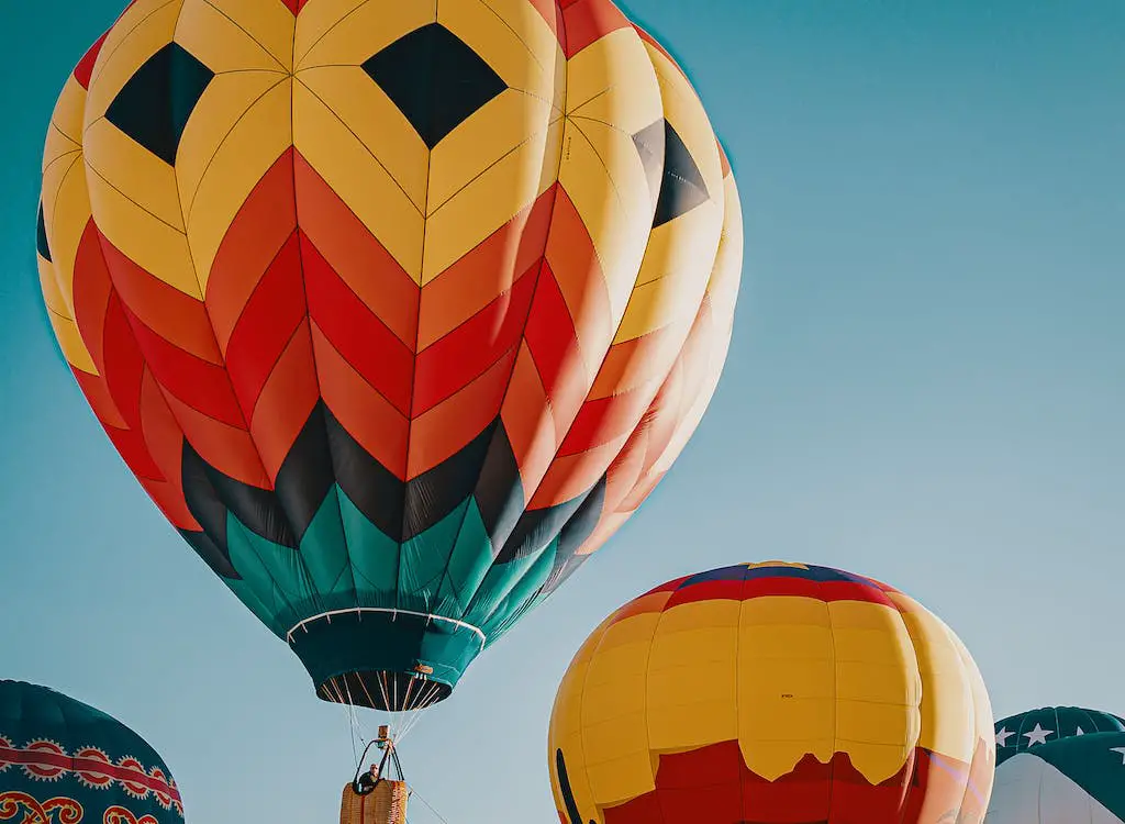 Image of colorful hot air balloons in the sky.